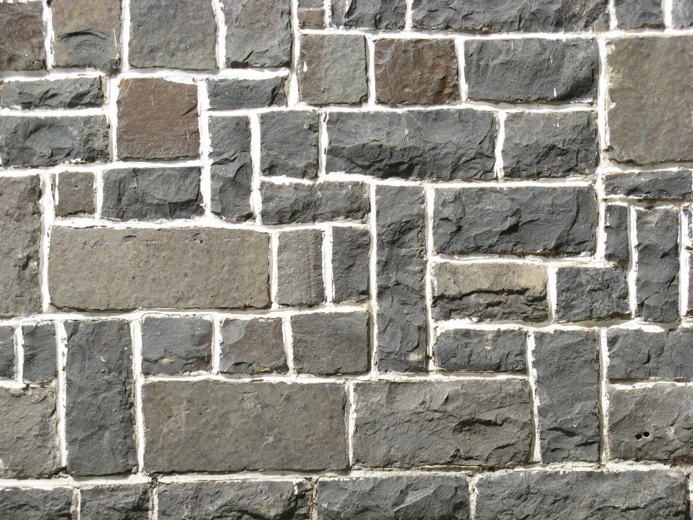 brown and gray brick wall