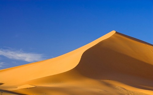 Image brown desert under blue sky during daytime