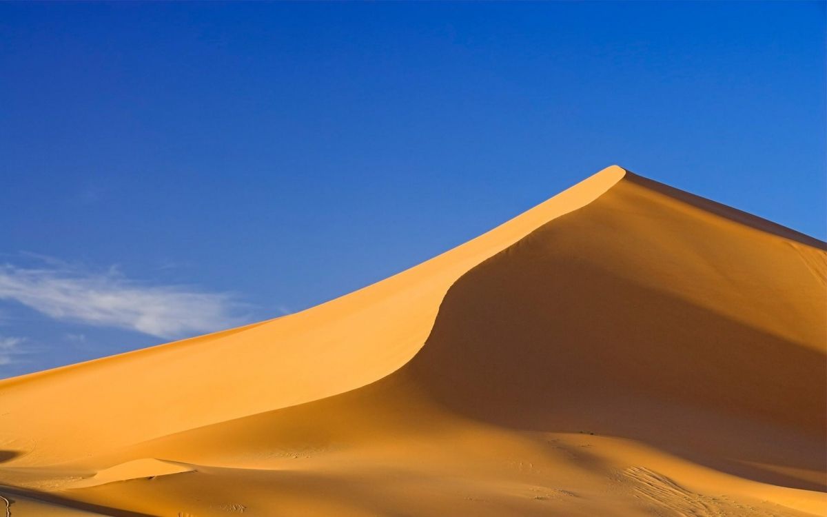 brown desert under blue sky during daytime