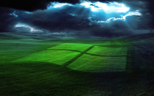 Image green grass field under white clouds and blue sky during daytime