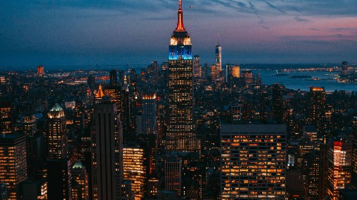 Image aerial view of city buildings during night time