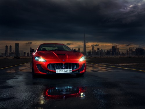 Image red bmw m 3 on road during night time