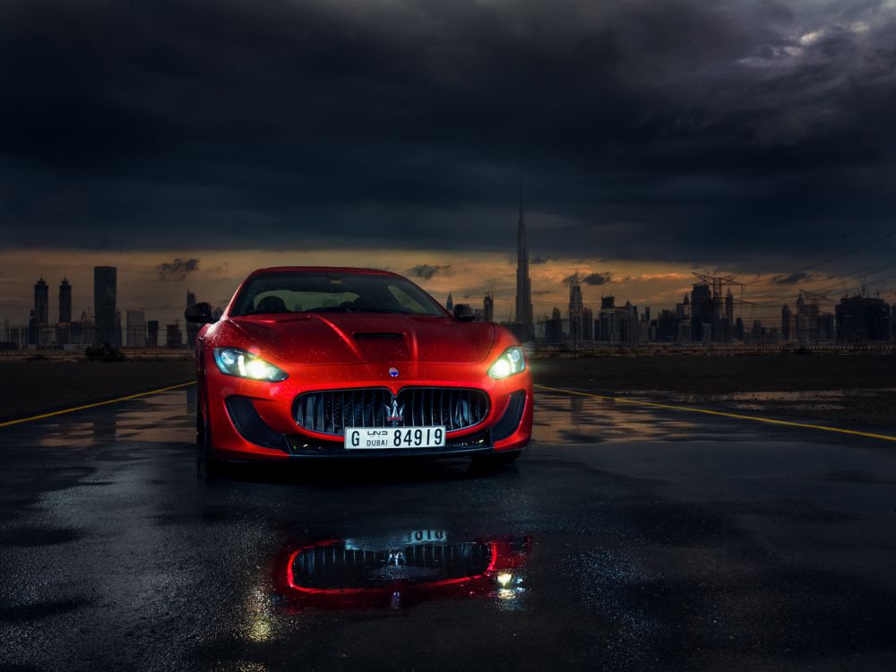 red bmw m 3 on road during night time