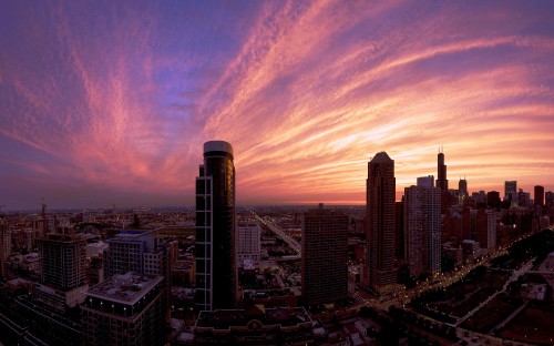 Image city skyline under cloudy sky during daytime