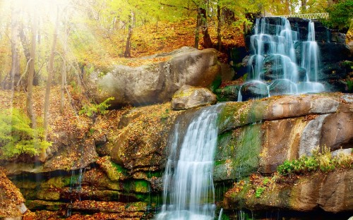 Image water falls on brown rock