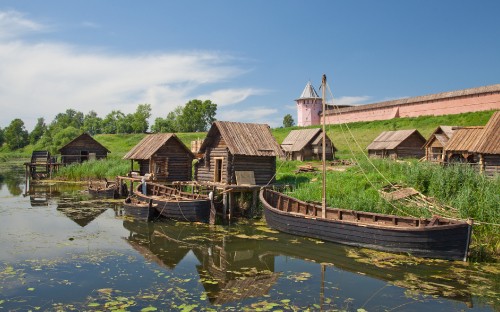 Image brown wooden house on water