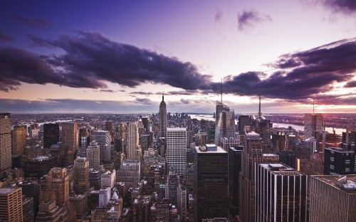 Image city skyline under blue sky during daytime