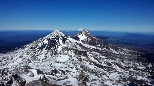 Image snow covered mountain under blue sky during daytime