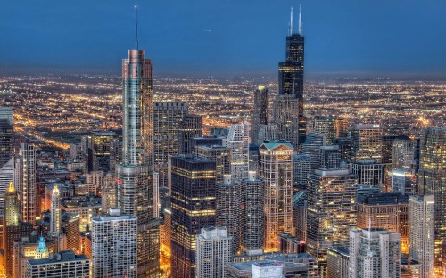 Image aerial view of city buildings during night time