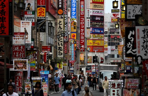 Image people walking on street during daytime