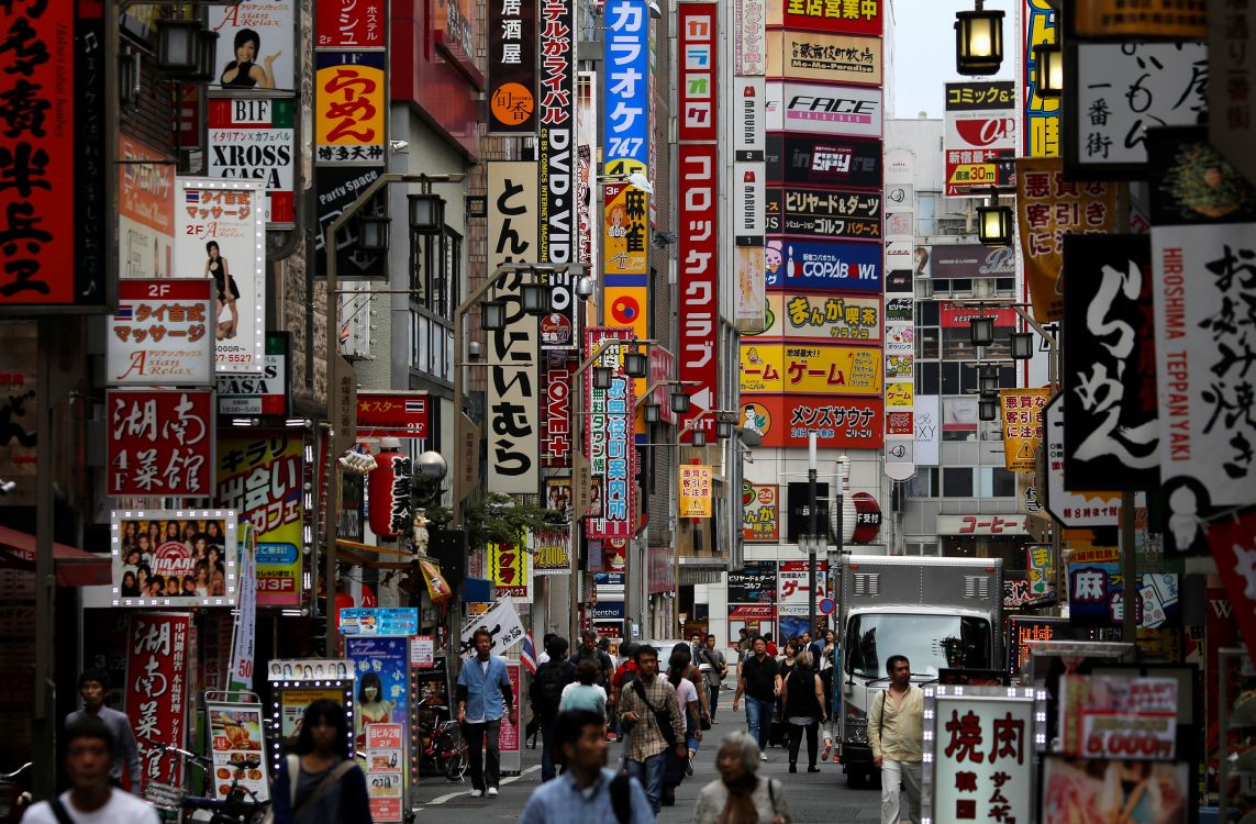 people walking on street during daytime