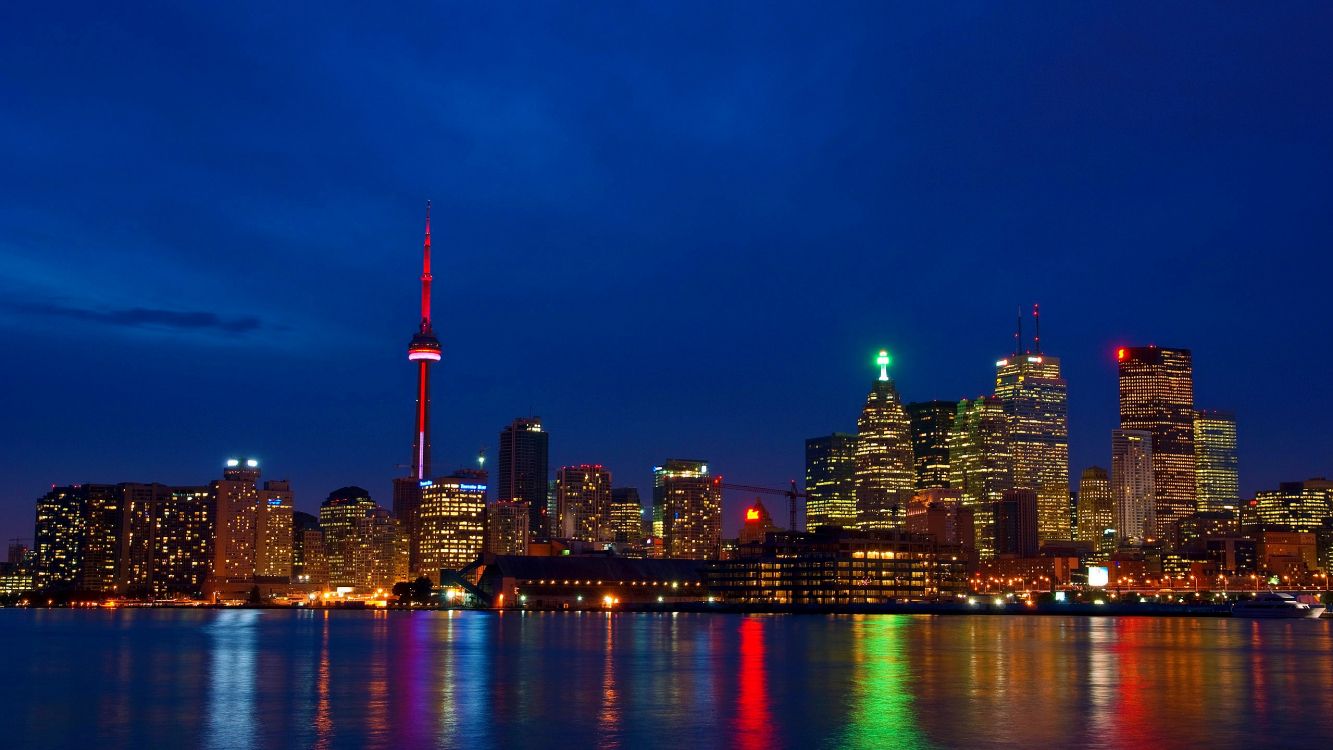 city skyline during night time