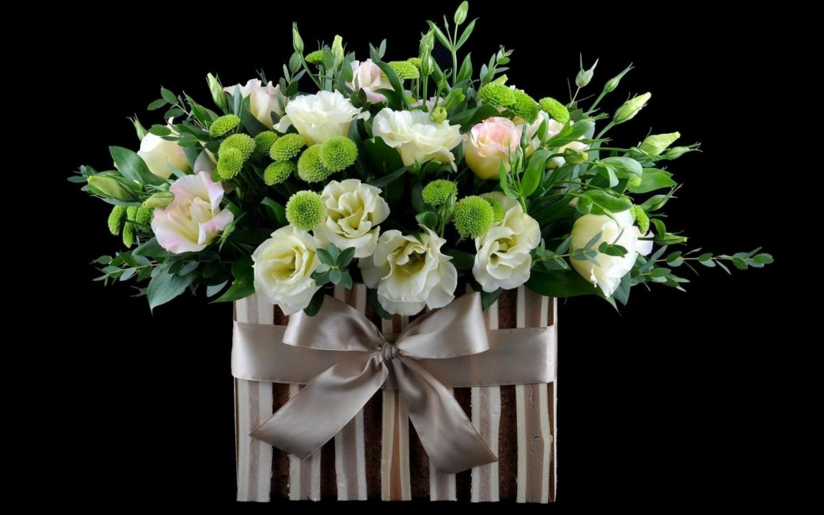 white and purple flowers on brown wooden box