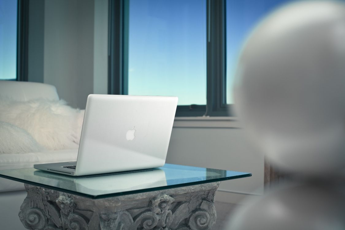 Silver Macbook on Green Table. Wallpaper in 5616x3744 Resolution