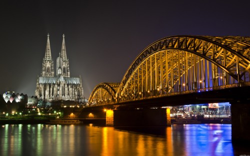 Image bridge over river during night time