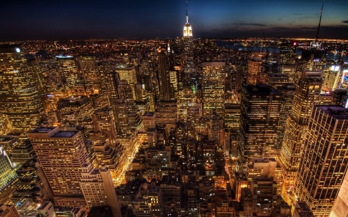 Image aerial view of city buildings during night time