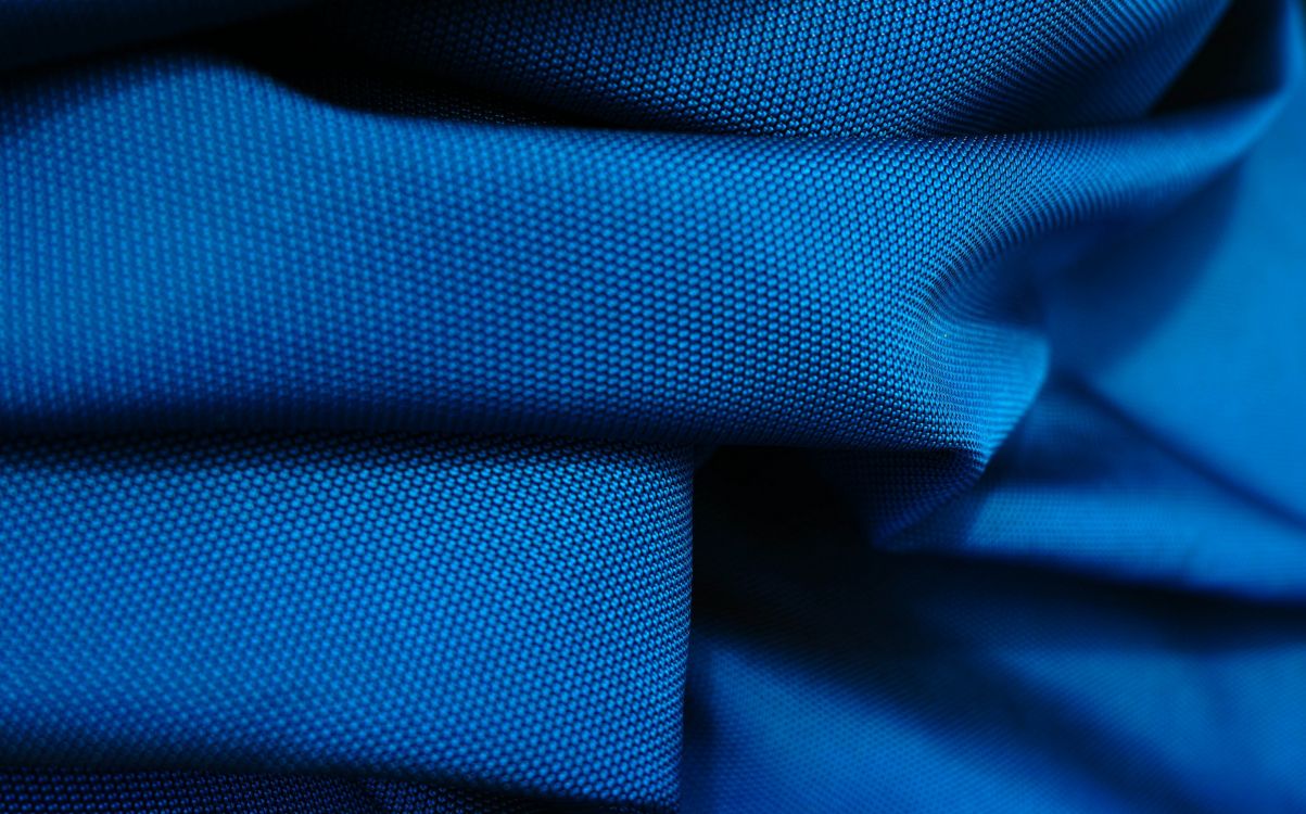 blue textile on blue textile