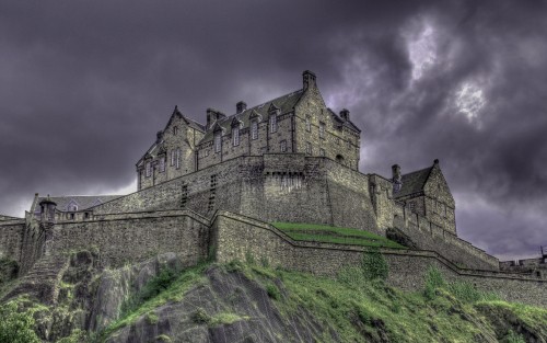 Image gray concrete castle under cloudy sky