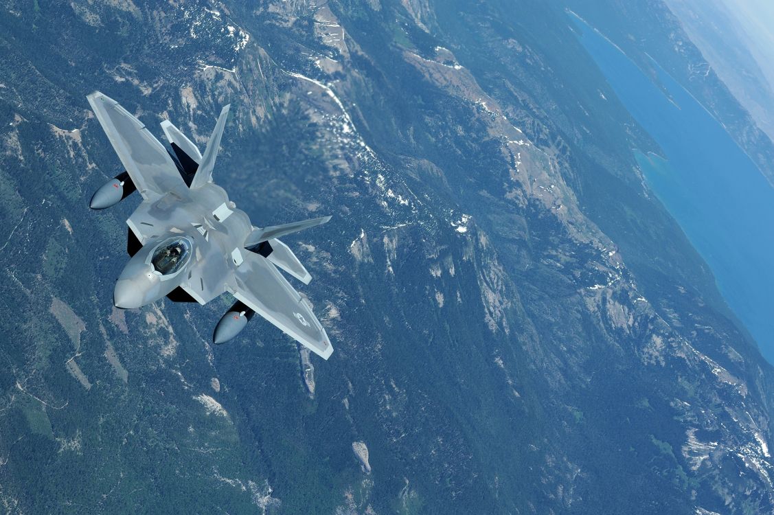 White Jet Plane Flying Over Blue and White Mountain. Wallpaper in 3040x2022 Resolution