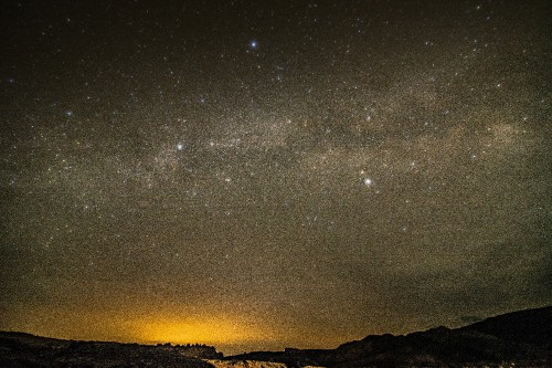 Image silhouette of mountain under starry night