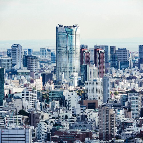 Image city skyline under white sky during daytime