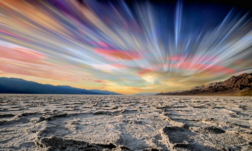 Image gray rocky shore under blue sky during daytime