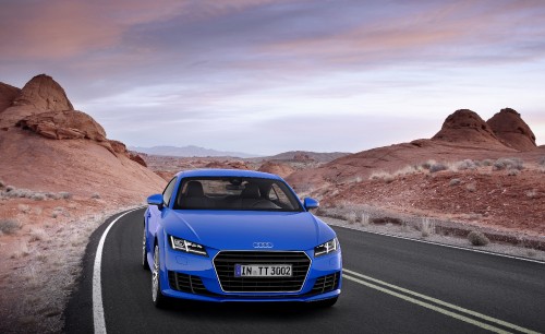 Image blue audi a 4 on road during daytime