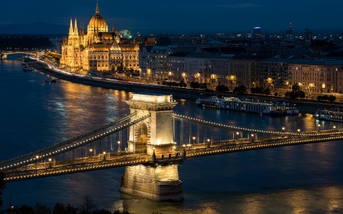 Image bridge over river during night time