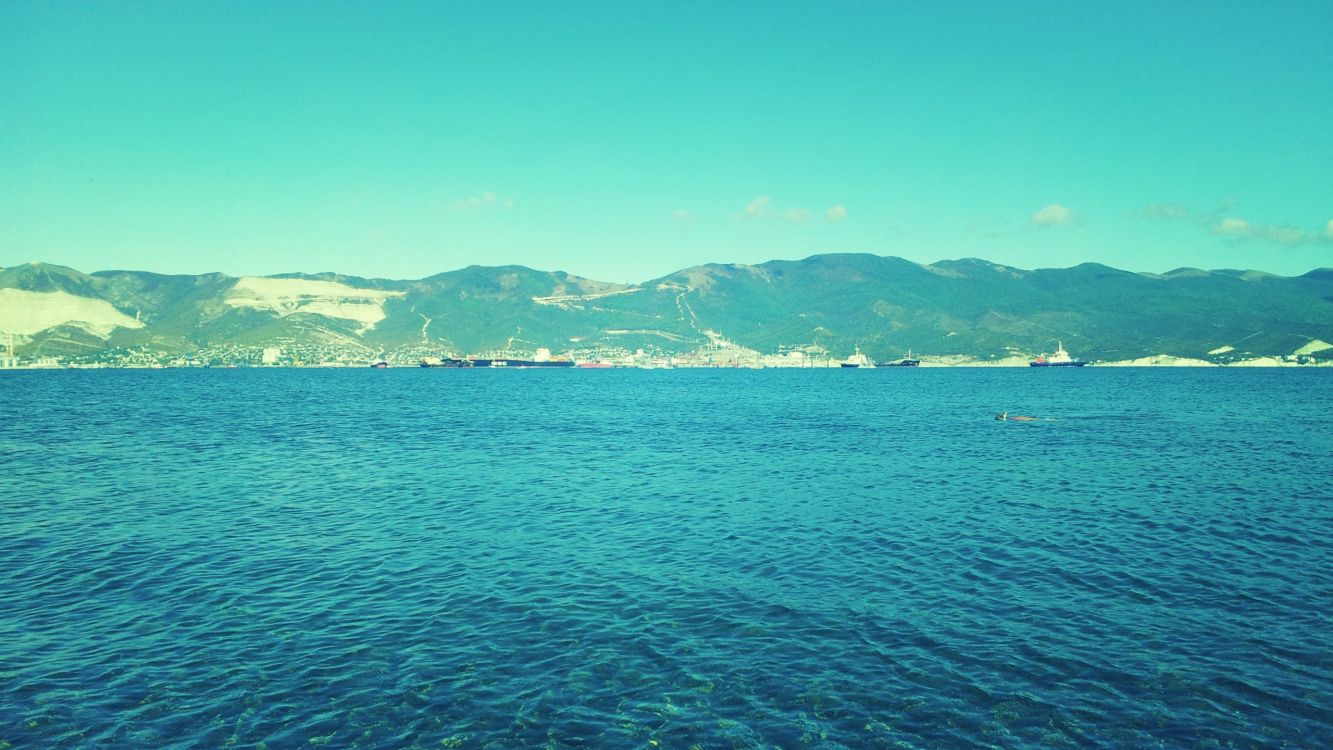 blue sea under blue sky during daytime