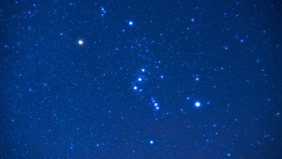 Image blue and white stars in blue sky