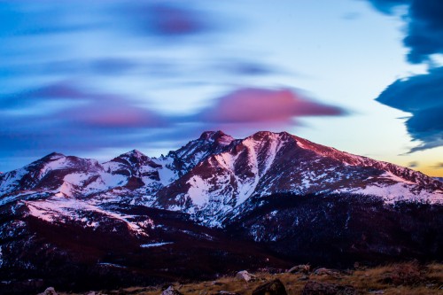 Image brown and white mountains under cloudy sky during daytime