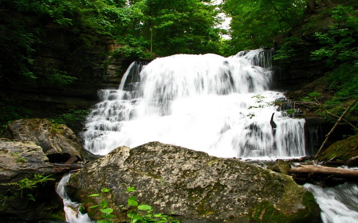 water falls on rocky ground