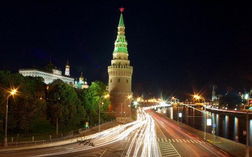 Image time lapse photography of cars on road during night time