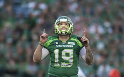 Image man in green and white football jersey