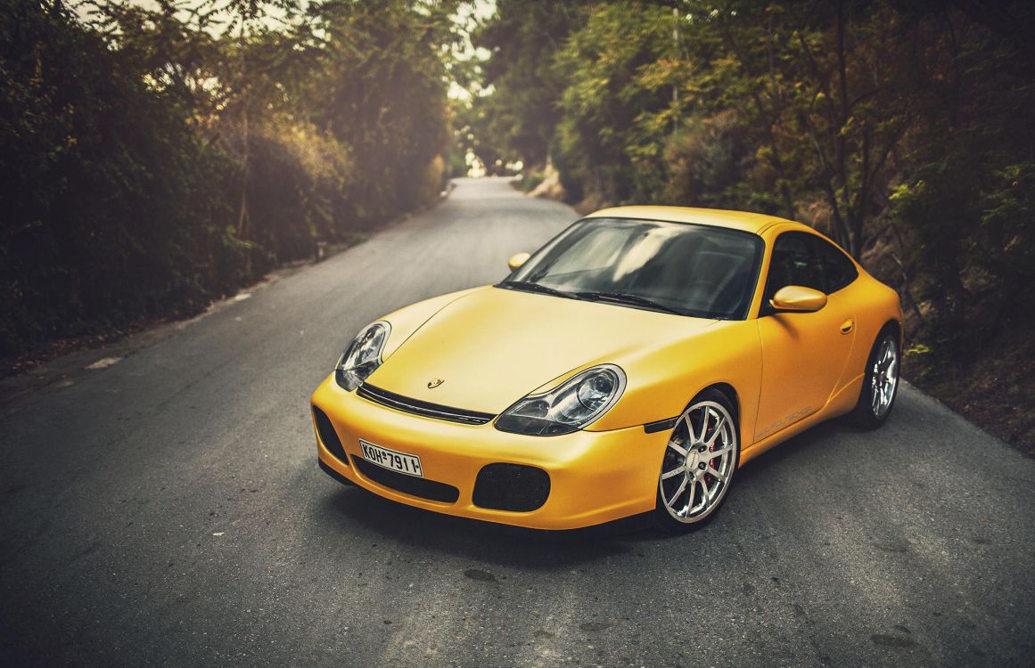 Yellow Porsche 911 on Road During Daytime. Wallpaper in 2048x1322 Resolution