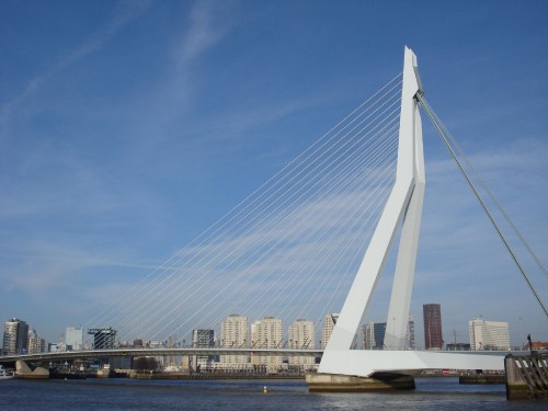 Image white bridge over body of water during daytime