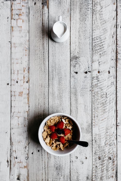 Some Colorful Cereal Scattered On Top Of A Wooden Table Background  Pictures Of Lucky Charms Background Image And Wallpaper for Free Download