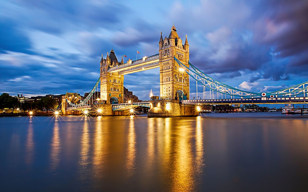 bridge over water during night time