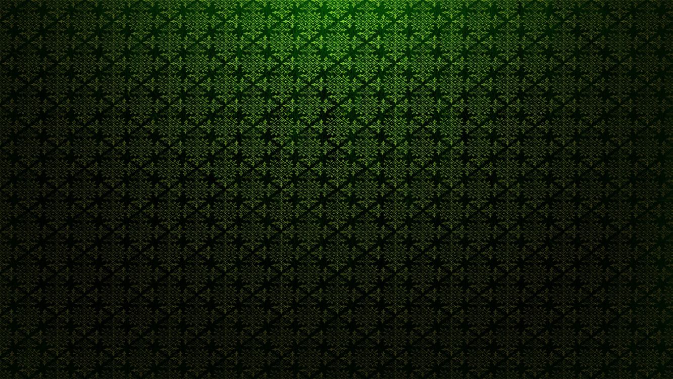 green and black floral textile