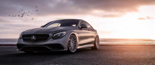 Image silver mercedes benz coupe on brown sand