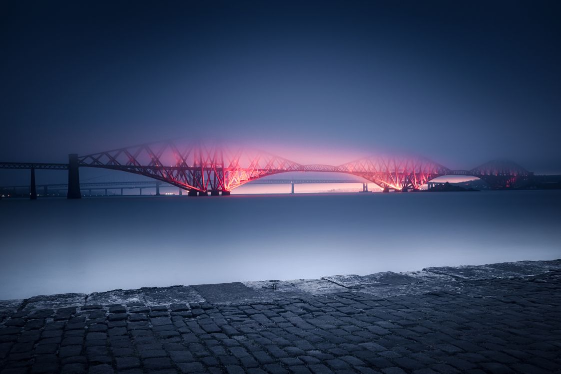 Rote Brücke Über Gewässer Während Der Nacht Night. Wallpaper in 6910x4612 Resolution