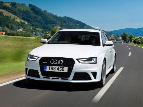 Image white audi a 4 on road during daytime