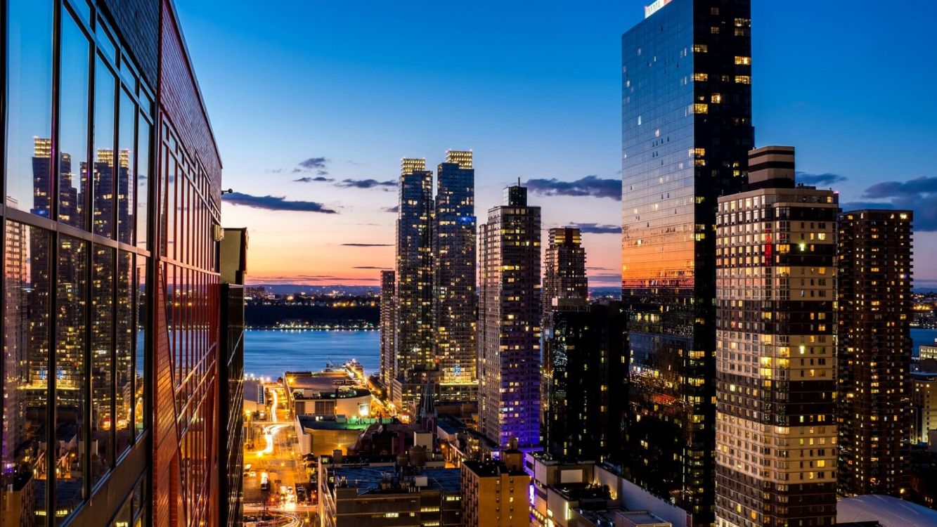 city skyline during night time