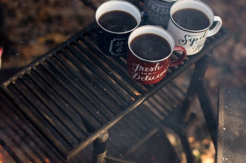 Image red and white coffee cup on black metal frame