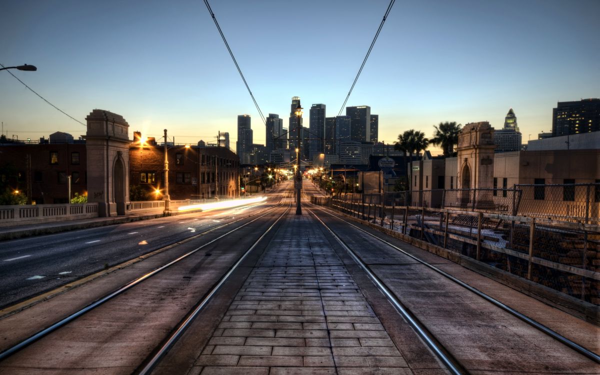 city buildings and road during daytime