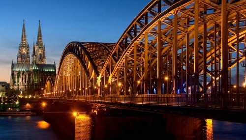 Image bridge over water during night time