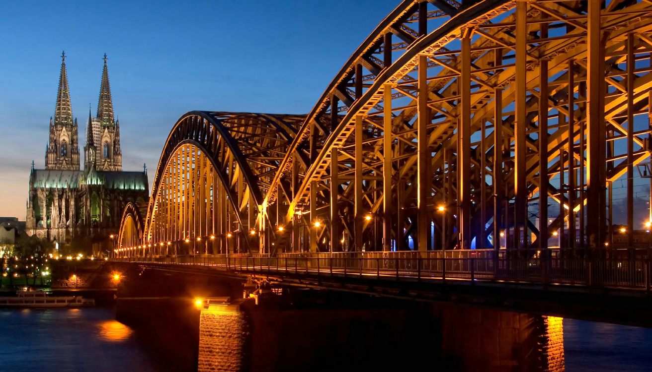 bridge over water during night time