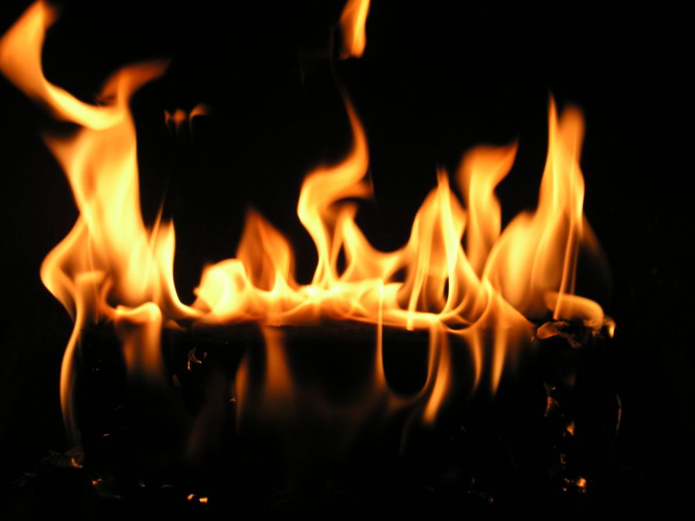 fire in the dark during night time