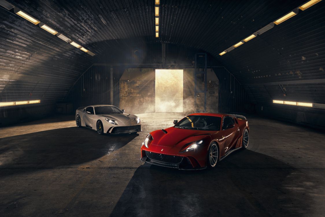 red ferrari 458 italia parked in garage