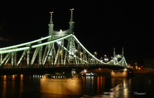 Image lighted bridge during night time